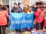 站前區(qū)怡園社區(qū)慰問(wèn)倒閘溝小學(xué)貧困兒童